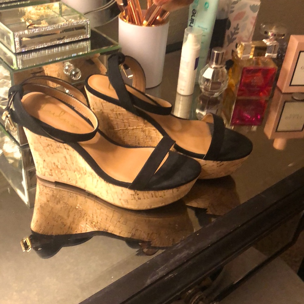 Black wedge sandal heel